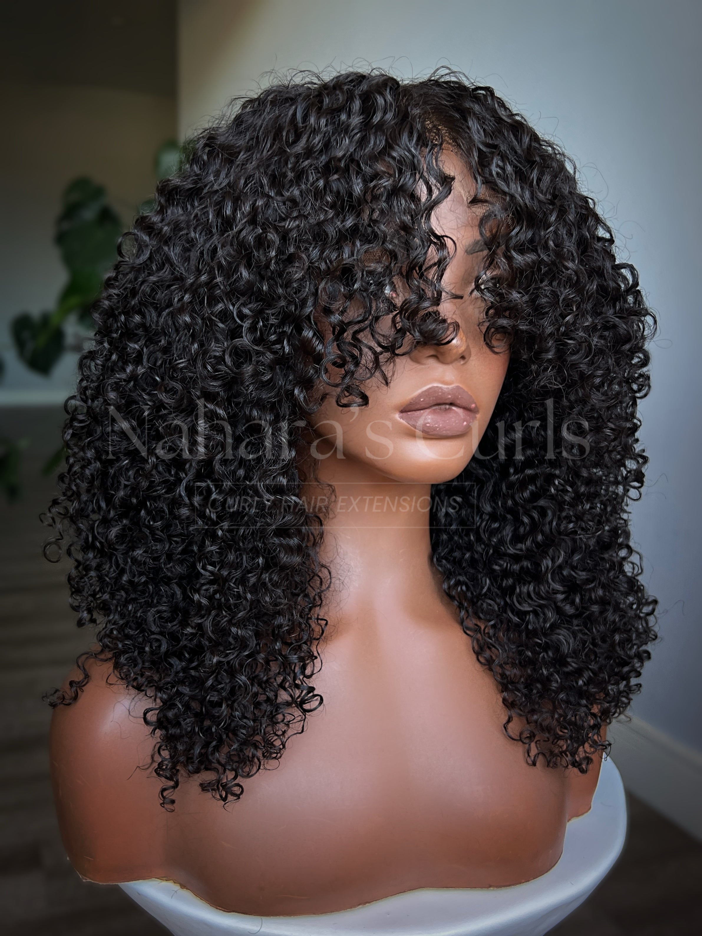 Human hair curly lace front wig with shag haircut, soft layered curls, and natural volume