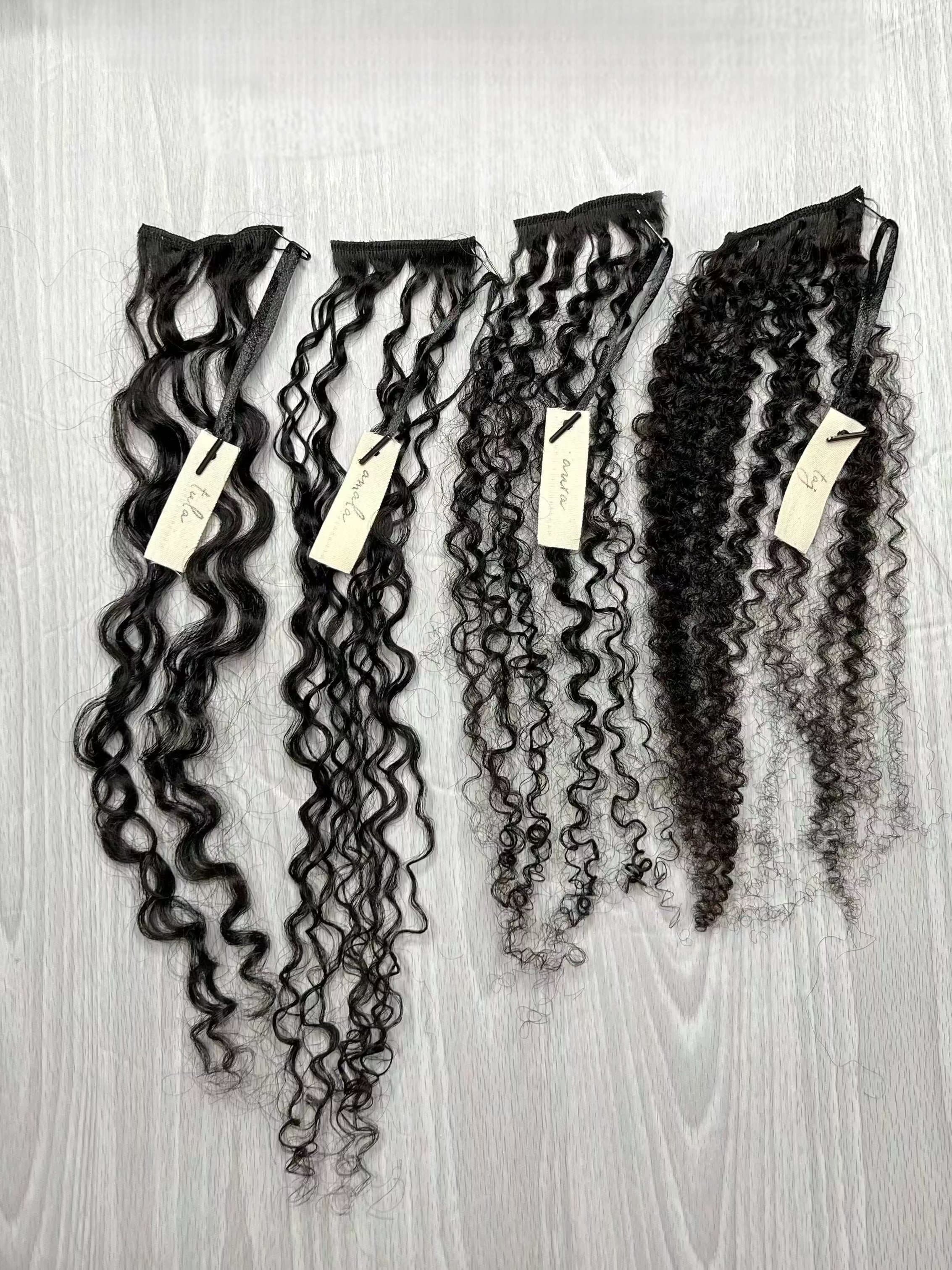 Nahara’s Curls Sample Box featuring Tula, Amala, Aura, and Taj hair textures