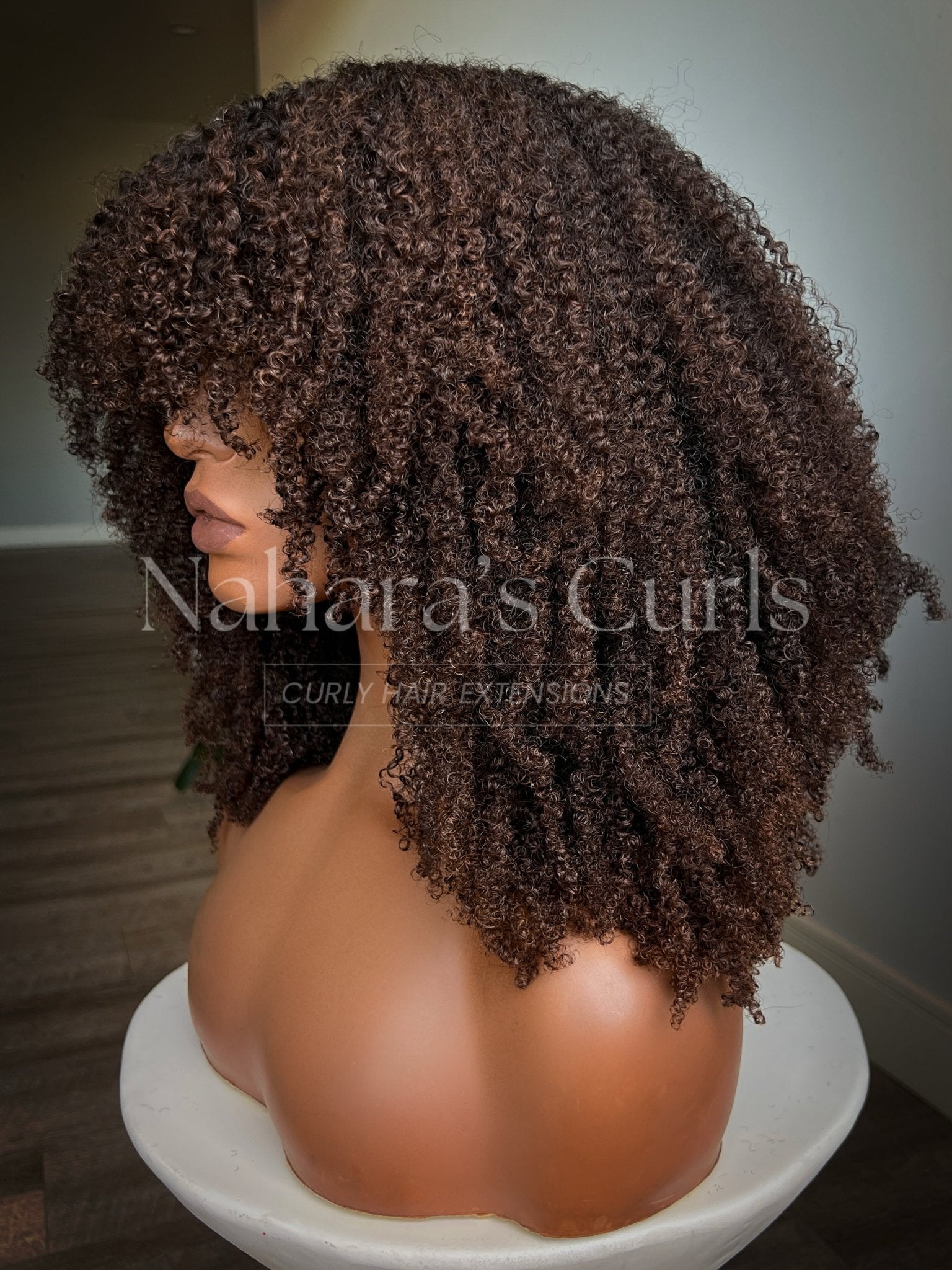 Second side angle of the Amara 13 by 6 HD Lace Front Wig highlighting fullness and layers