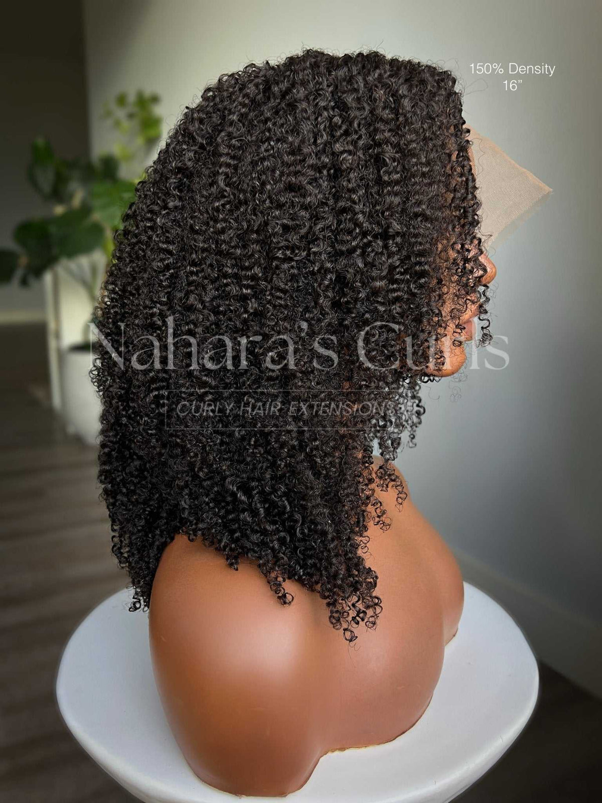 Side view of Aura’s springy kinky curls and natural shrinkage