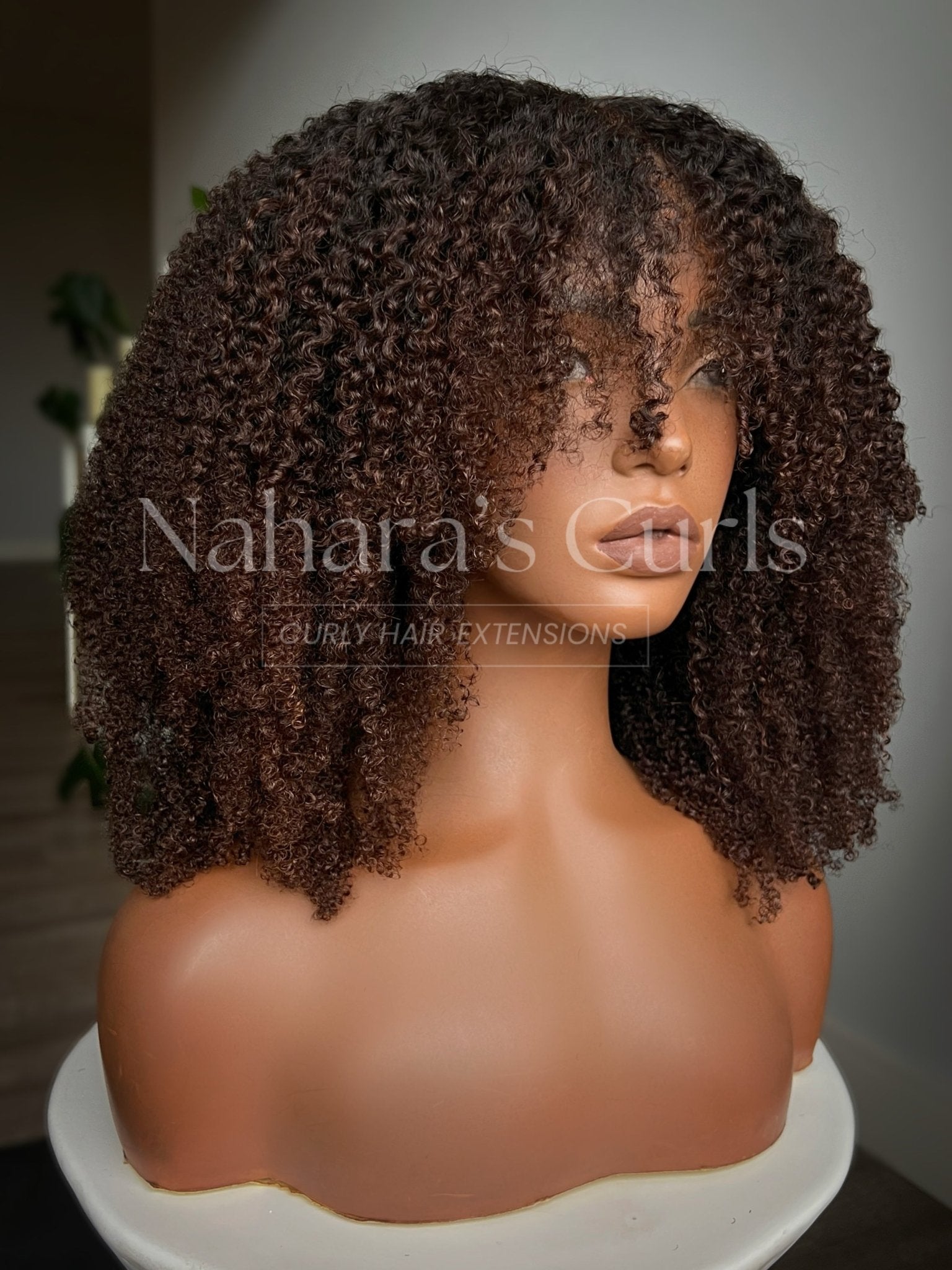 Side view of the Ishani 13 by 6 HD Contour Lace Front Wig highlighting the contour hairline and soft texture