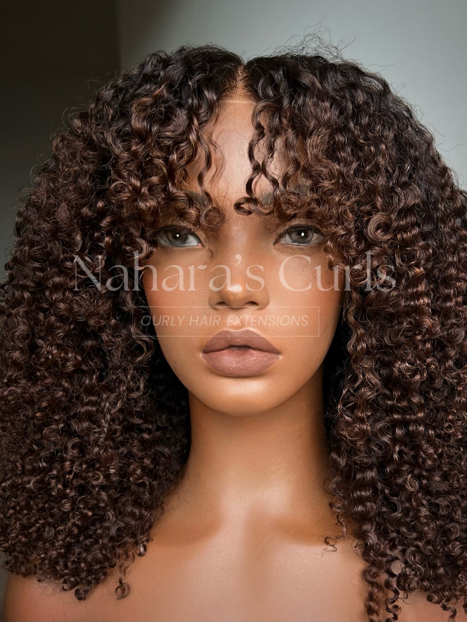 Close-up of Nila 13 by 6 HD Lace Front Wig showing defined kinky curls and natural HD lace hairline