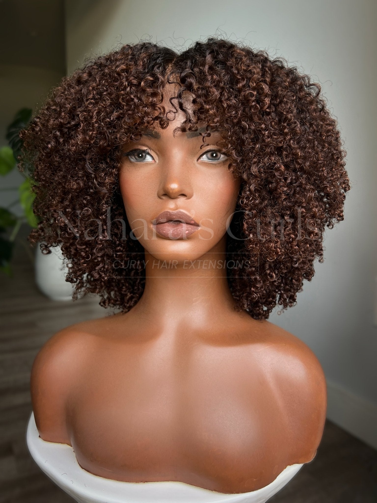 Natural-looking kinky curly lace front wig with chocolate brown balayage and springy curls
