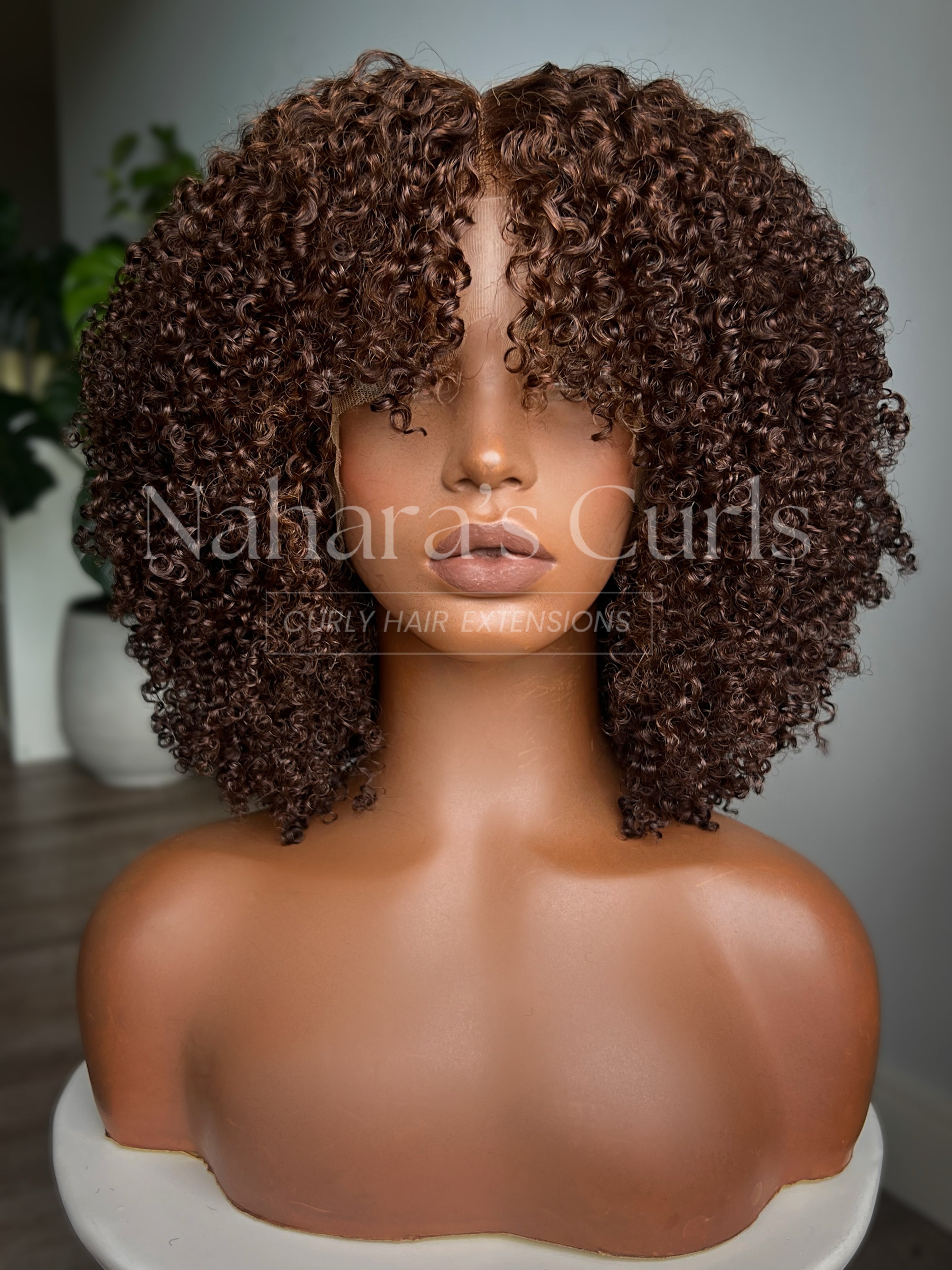Vahni 13x6 HD Lace Front Wig front view with defined Aura curls