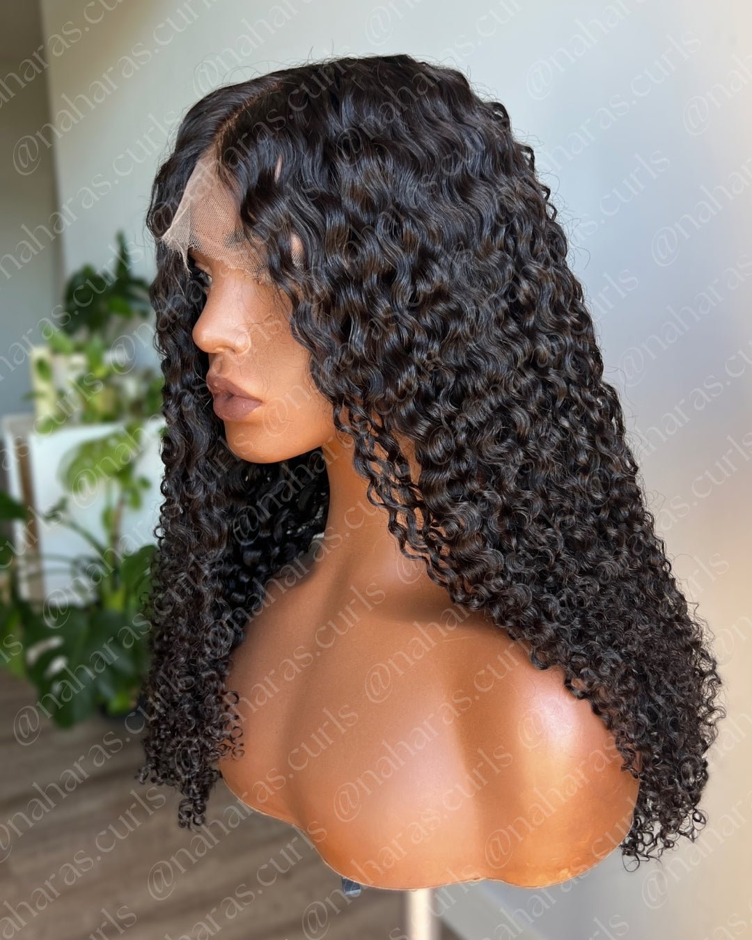 Side view of Tula Amplified 13x6 lace front wig highlighting defined texture and shine