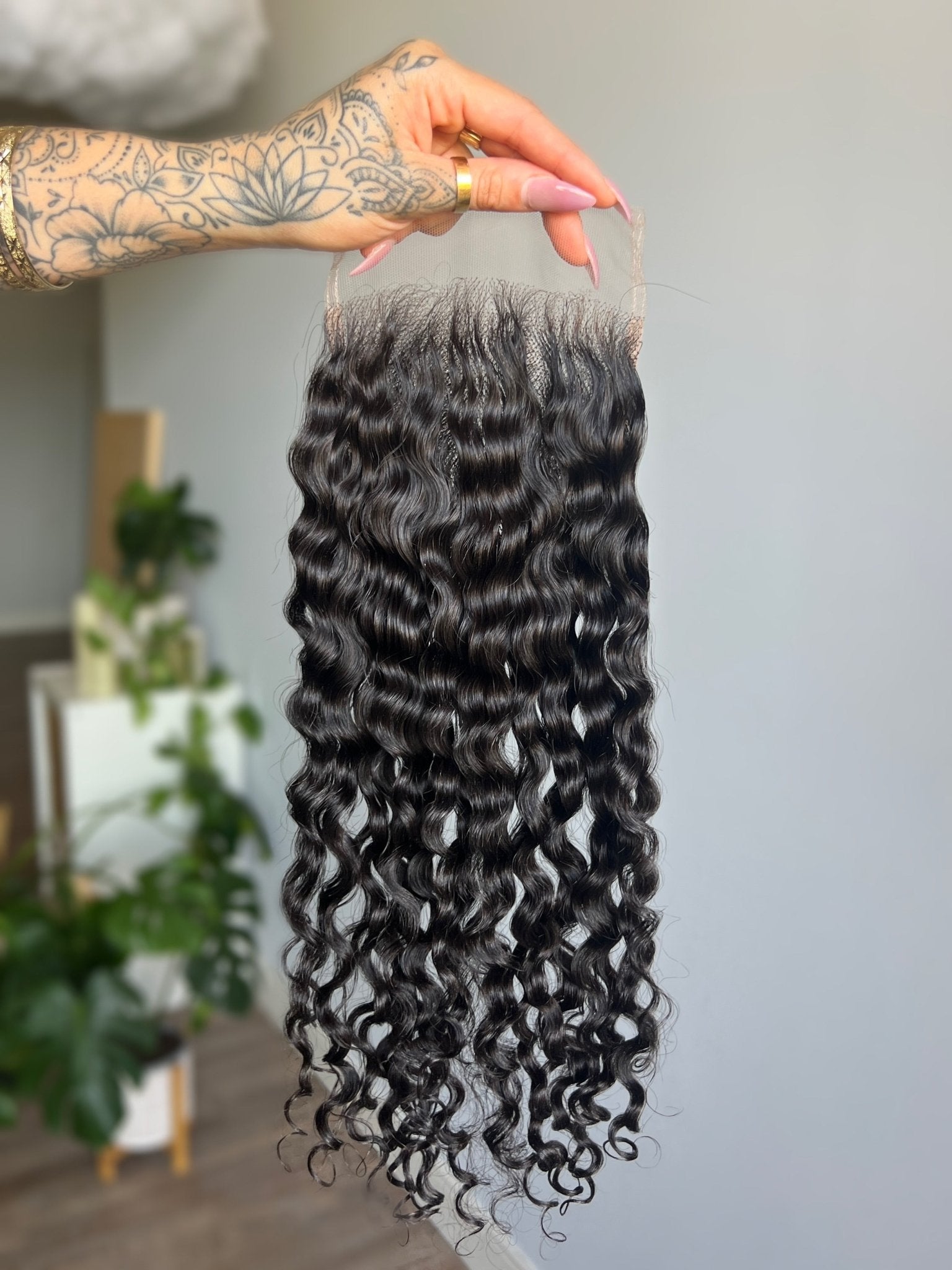 Back view of Tula Lace Closure featuring loose wave texture