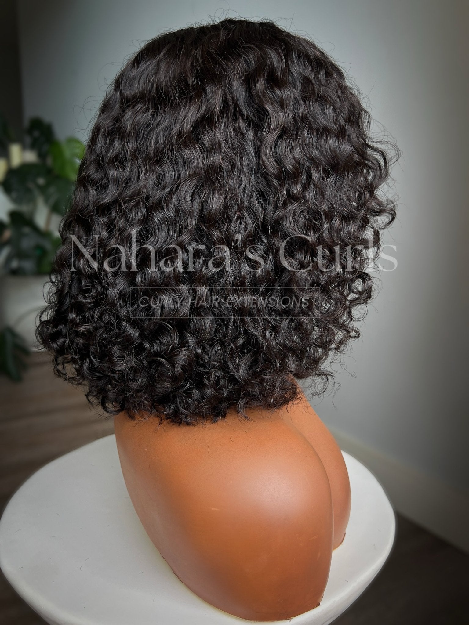 Side view of Umika HD Lace Front Wig highlighting soft Tula Soft Wave (3A/3B) movement