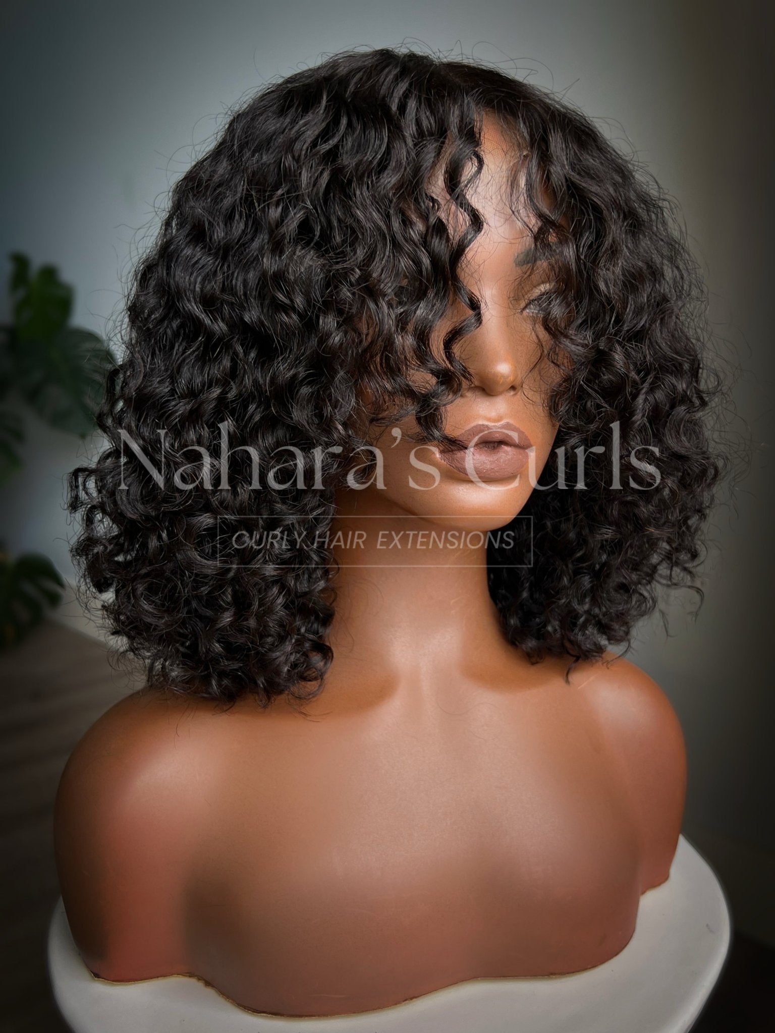 Side view of Umika HD Lace Front Wig highlighting soft Tula Soft Wave (3A/3B) movement