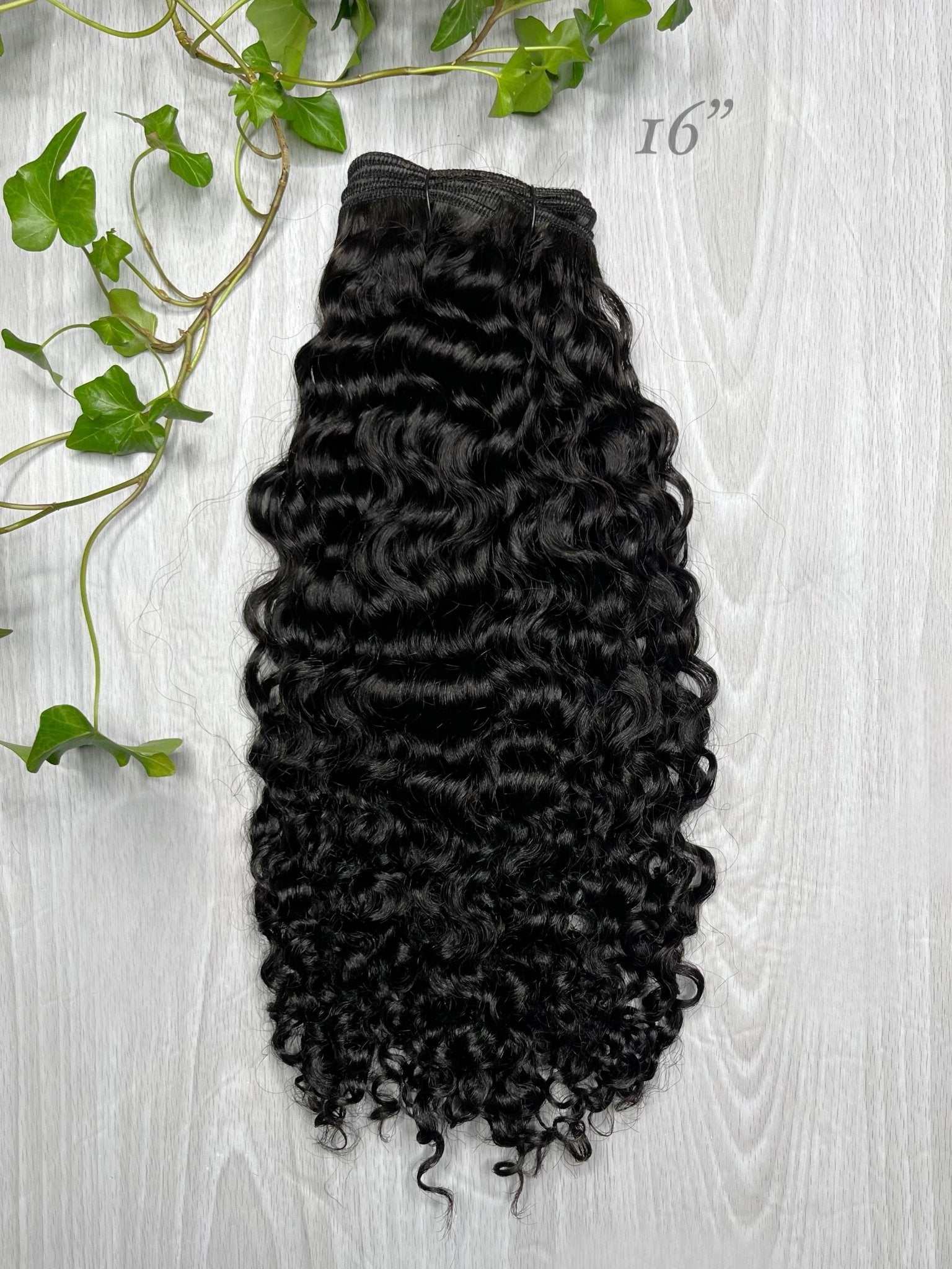 Nahara’s Curls Amala Wefted Hair – premium loose curls showing natural texture and soft, voluminous definition