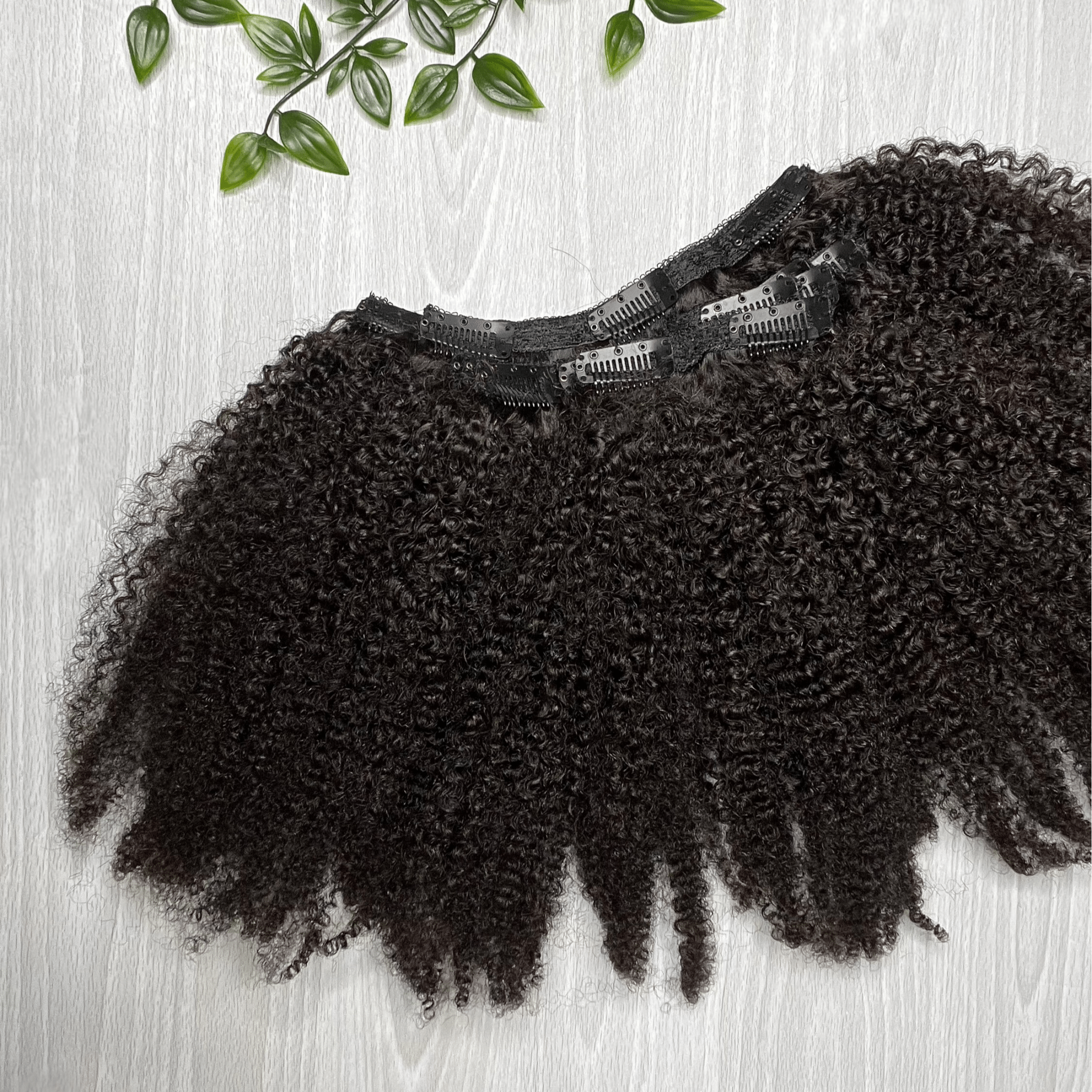 Taj Coily Clip-In Hair Extensions made from 100% virgin Indian hair, natural texture for Black hair