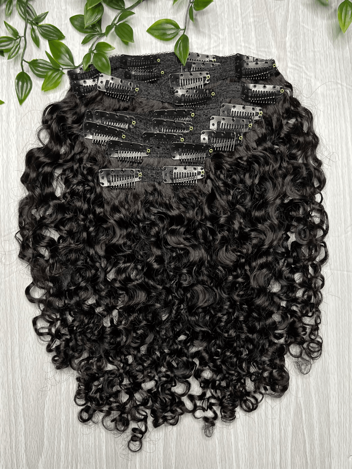 Tula Clip-Ins curly hair extensions made from 100 virgin Indian hair with clip-in attachment system