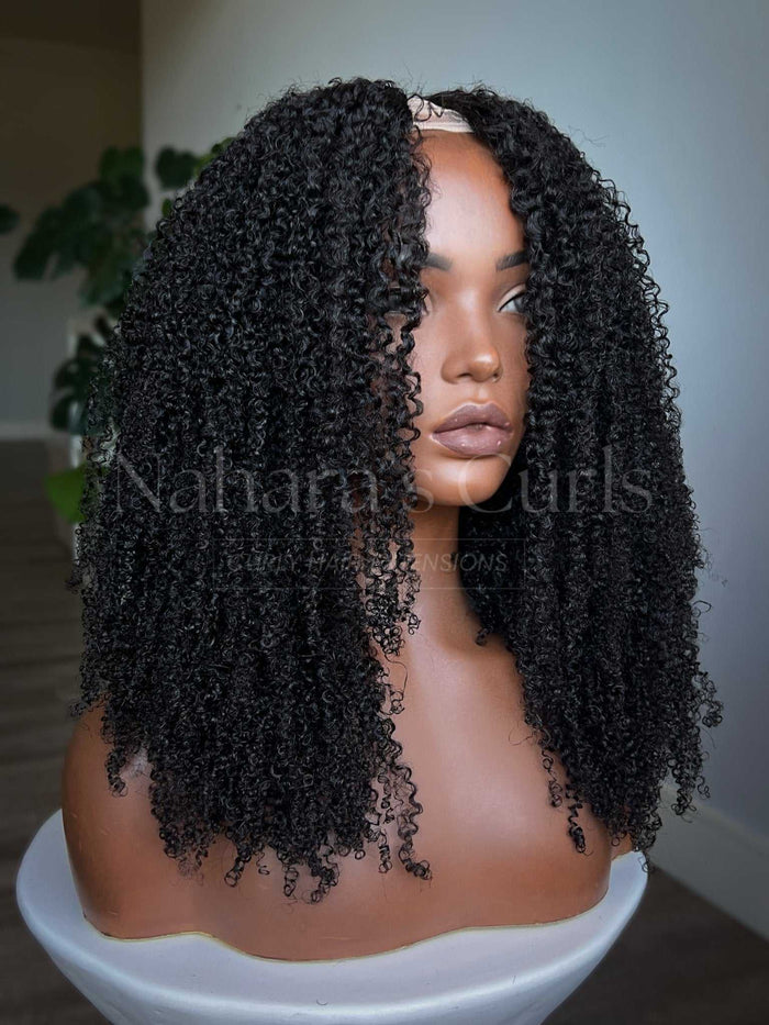 Front view of the Aura U-Part Wig with full, springy kinky curls