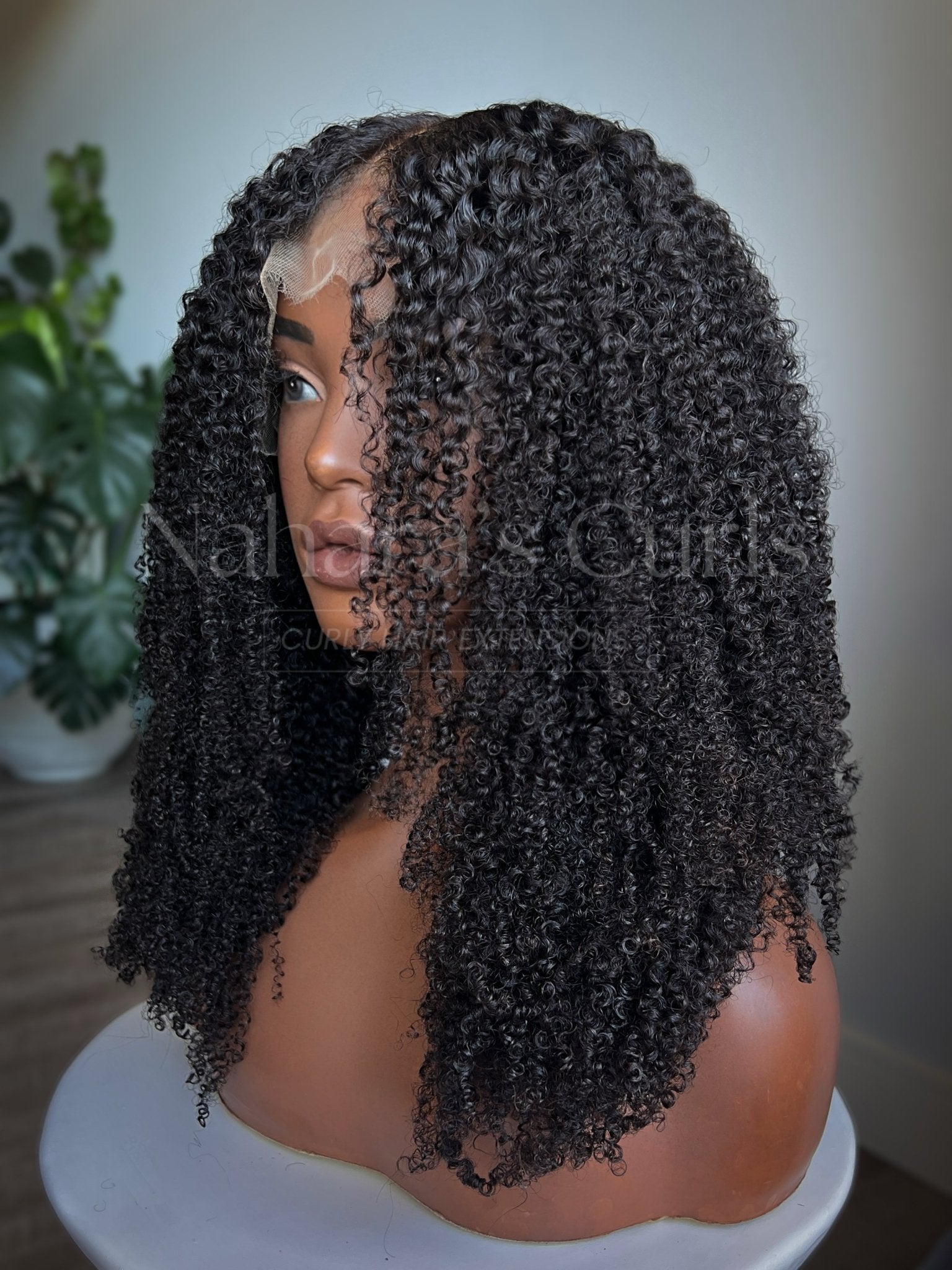 Close-up of Aura 13x6 HD Lace Front Wig curls with natural movement and density