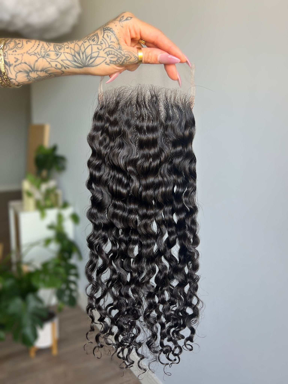 Back view of the Tula Lace Closure showing loose wave pattern and length