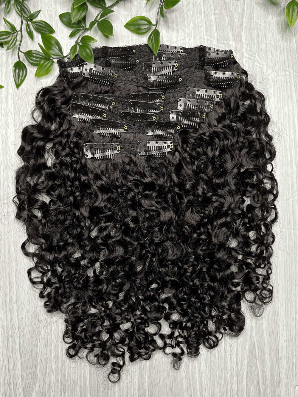 Tula Clip-Ins curly hair extensions made from 100 virgin Indian hair with clip-in attachment system